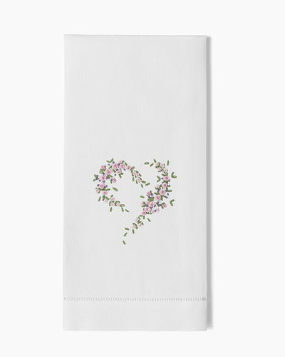 Henry Handwork white linen hand towel with embroidered pink floral heart wreath motif.