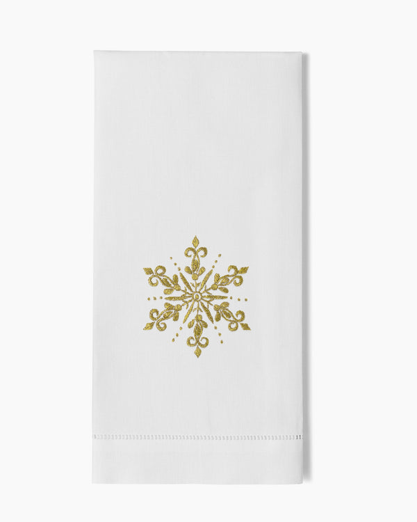 Photo of the Snowflake Gold Hand Towel ensemble.
