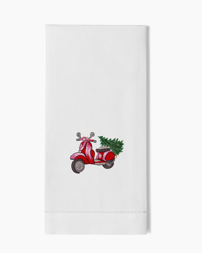Henry Handwork white linen hand towel with embroidered red Vespa carrying a Christmas tree.