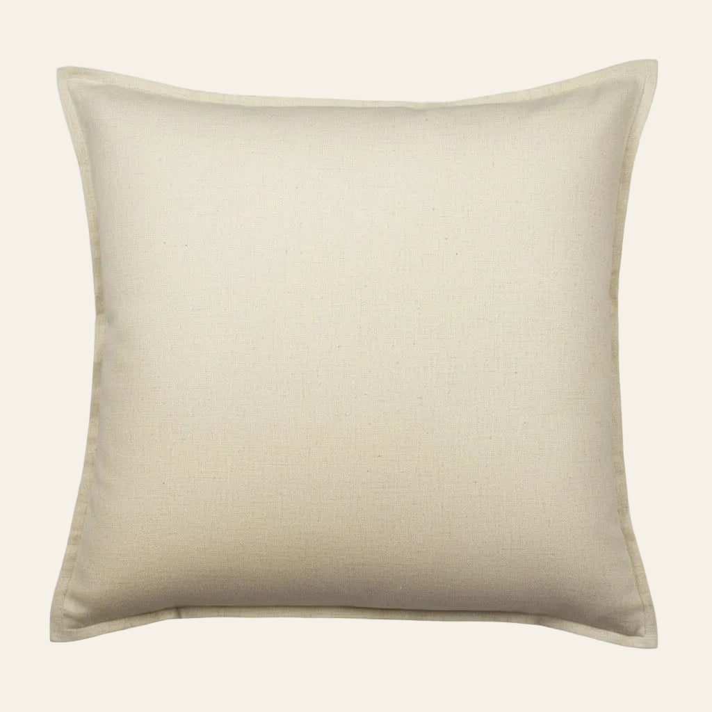 Ann Gish Hammered sham in ivory linen with a self-flanged border, front view.
