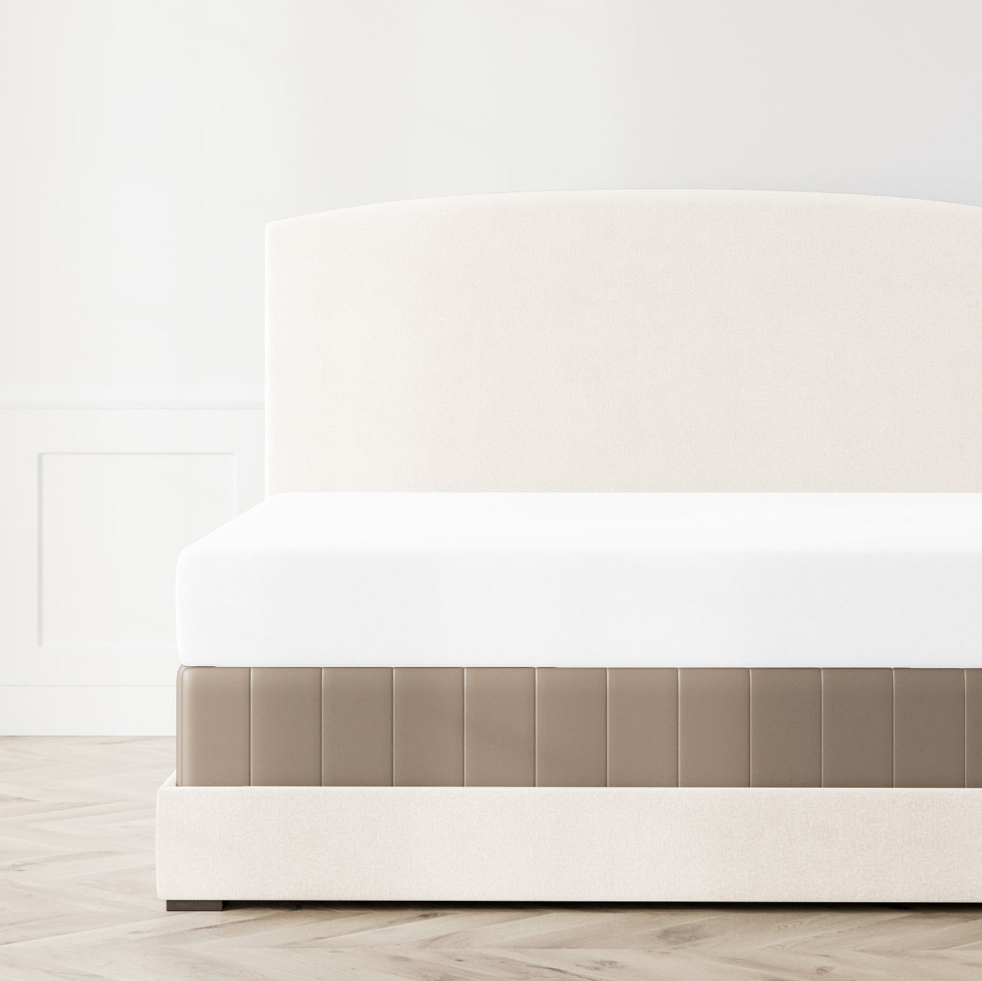 Ann Gish Hammered box spring cover in taupe, shown on bed with vertical channel detail.