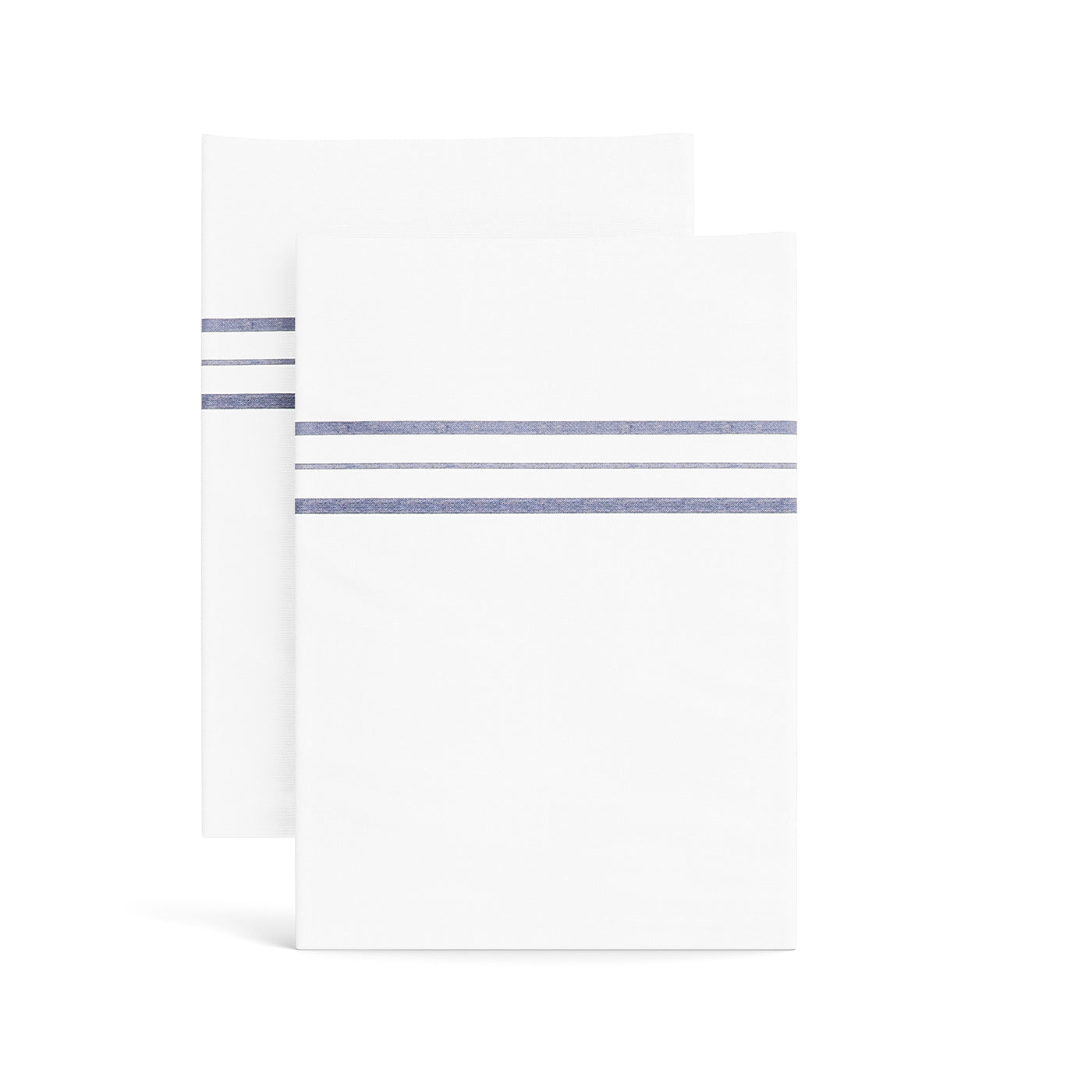 Ann Gish Hem Stripe pillowcases in white with navy triple-stripe hem detail, pair shown.