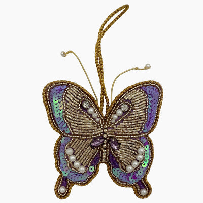Henry Handwork butterfly ornament with gold beading, purple sequins, and pearl accents.