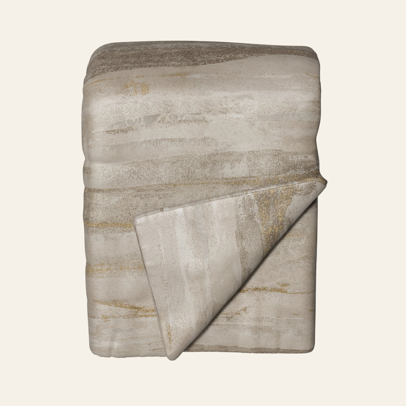 Ann Gish Horizon throw in taupe and gold abstract brushstroke pattern, folded flat.