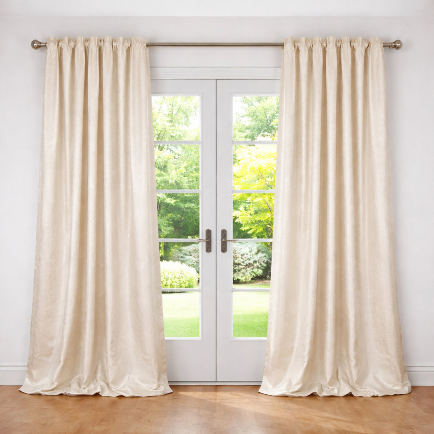 Ann Gish Imprint curtains in ivory dupioni silk, floor-length panels framing garden doors.