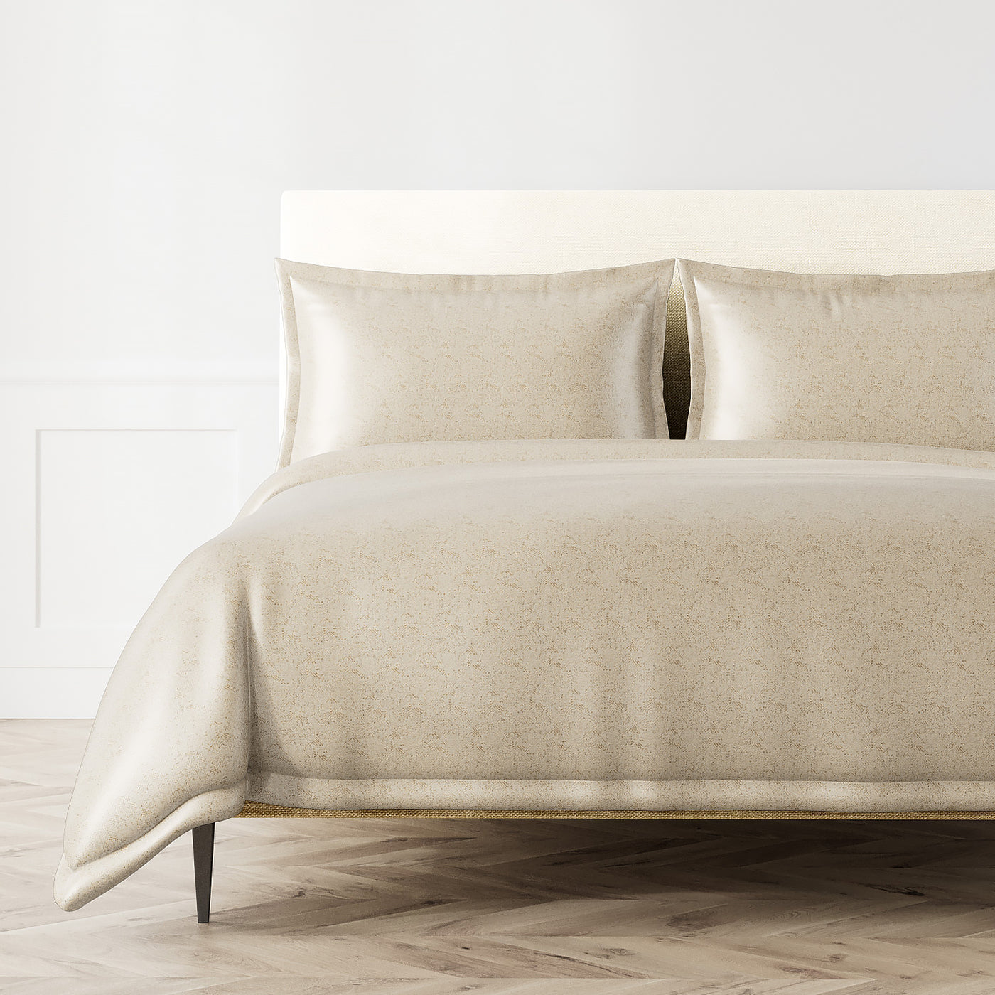Ann Gish Imprint duvet set in champagne with subtle textured pattern on styled bed.