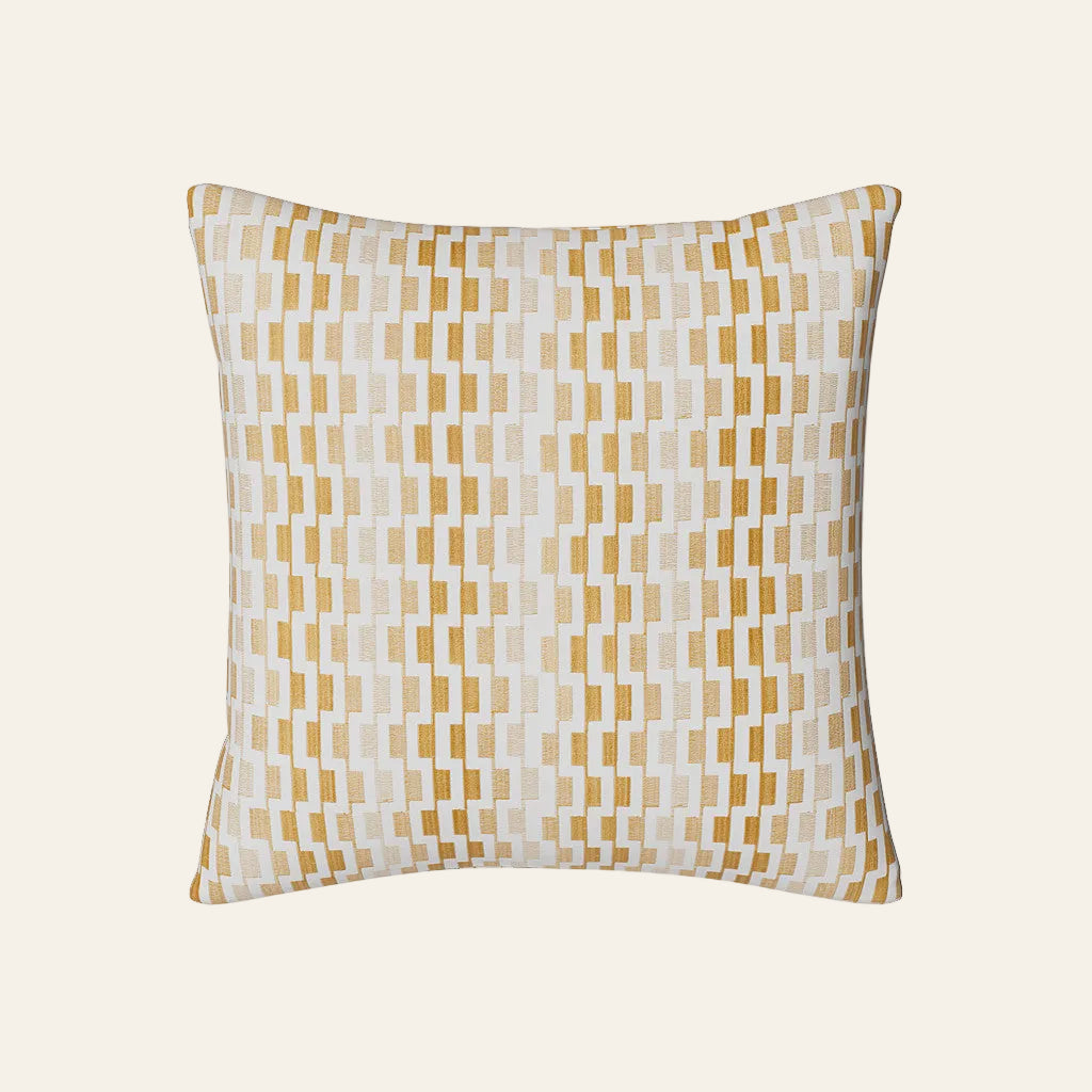 Ann Gish Ingot pillow in gold and ivory woven rectangular block pattern.