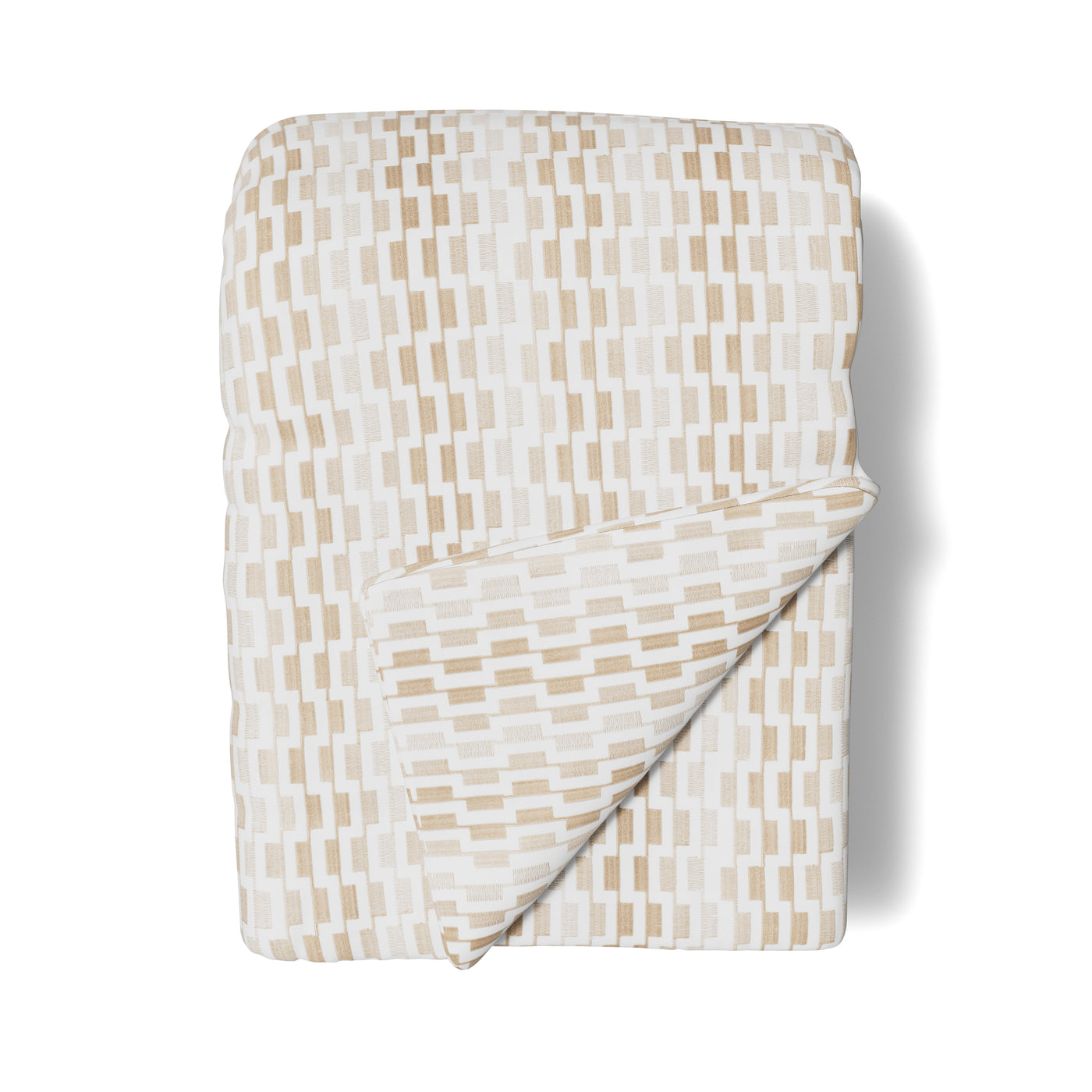 Ann Gish Ingot throw folded flat, ivory and champagne geometric brick pattern visible.