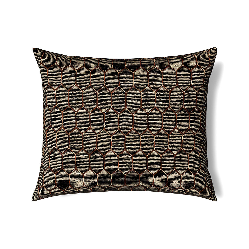 Close-up of Ann Gish Inro pillow showing charcoal and copper geometric honeycomb woven pattern.