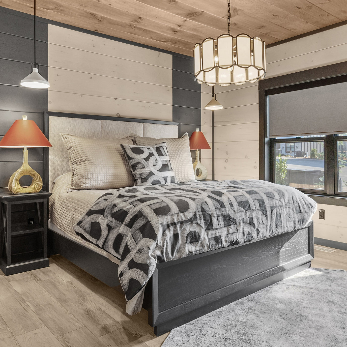 Interchange duvet in charcoal geometric pattern styled on bed in rustic modern bedroom setting.