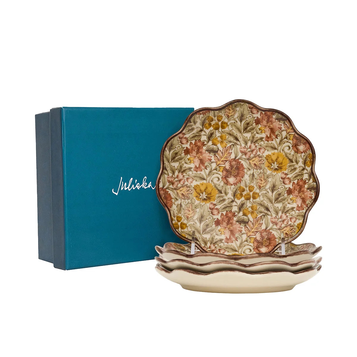 Juliska Willa cocktail plates stacked beside a teal Juliska gift box