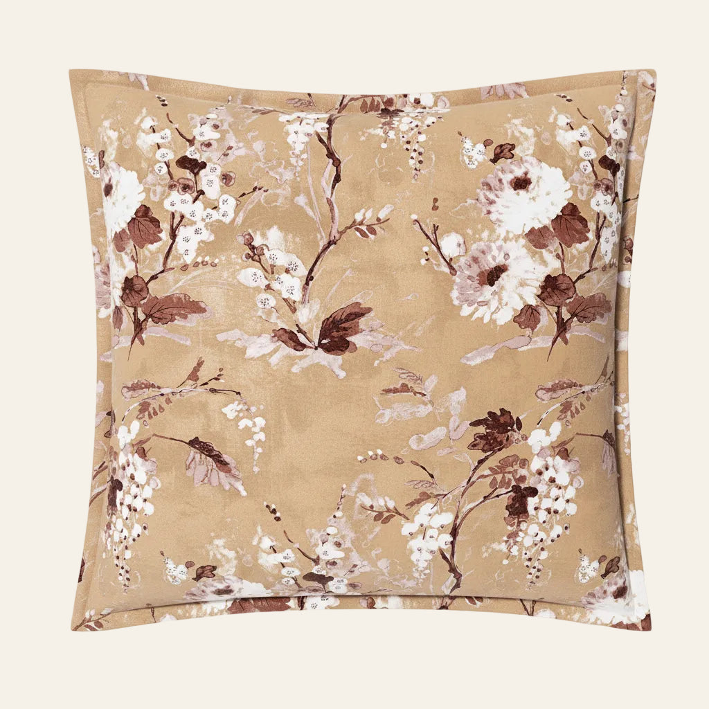 Ann Gish Jardin Fleur sham in gold with white and burgundy floral print, flanged edge.
