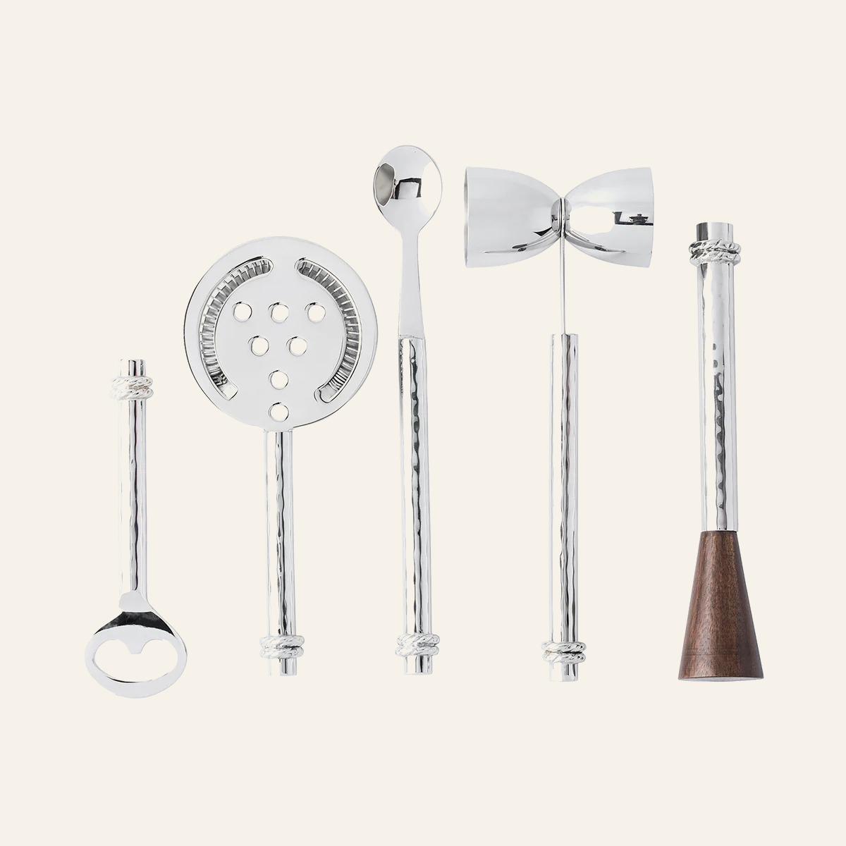 Five-piece Juliska Graham bar tool set in polished silver with hammered handles and walnut muddler base.