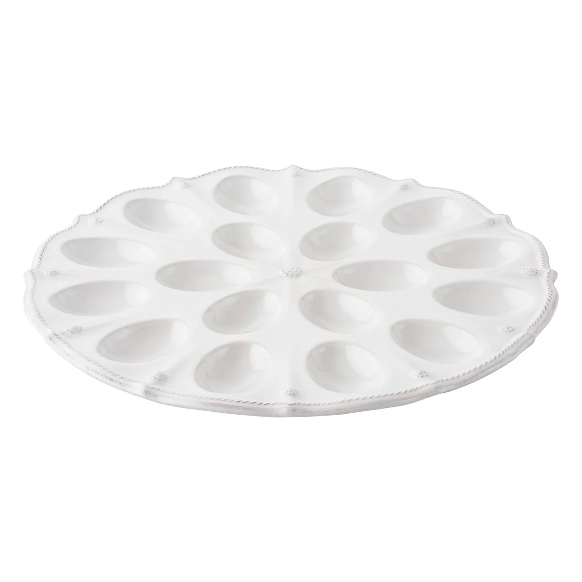Overhead angle of white ceramic deviled egg platter with beaded rim detail.