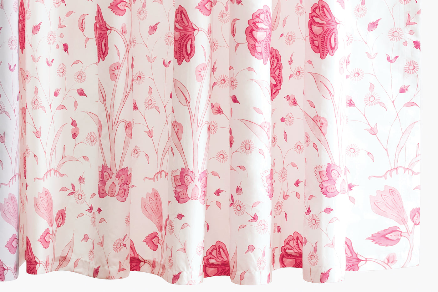Floral patterned fabric with pink flowers on a white background
