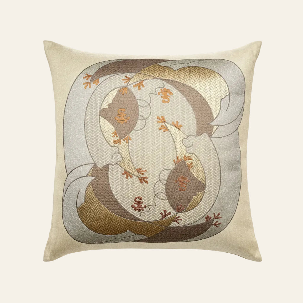 Ann Gish Kosode pillow in ivory with embroidered gold and taupe gecko motif.