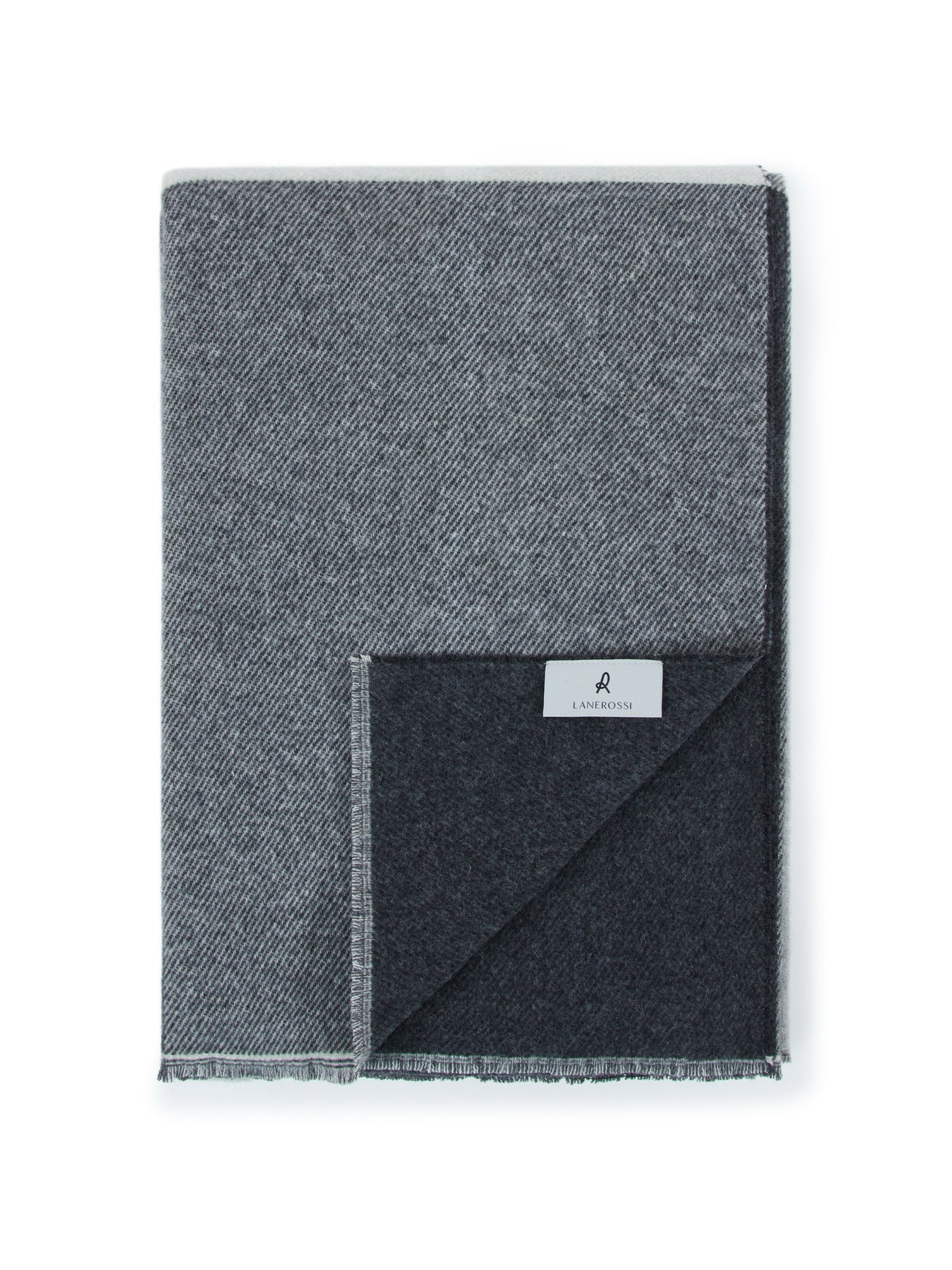 Lanerossi Ascot throw in charcoal and grey herringbone weave with fringe trim, folded flat.