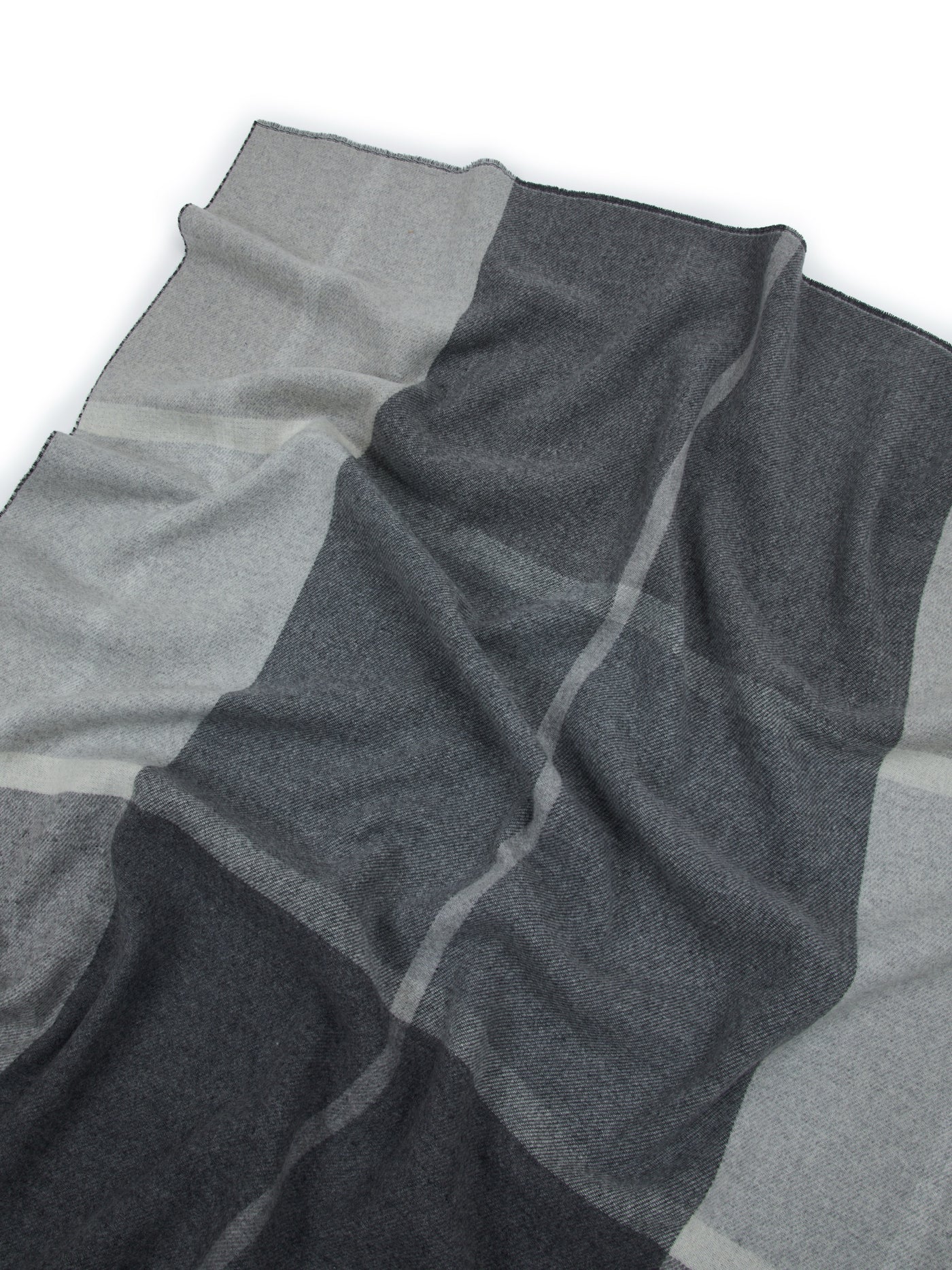 Close-up of Lanerossi Ascot throw showing charcoal and silver colorblock panel detail.