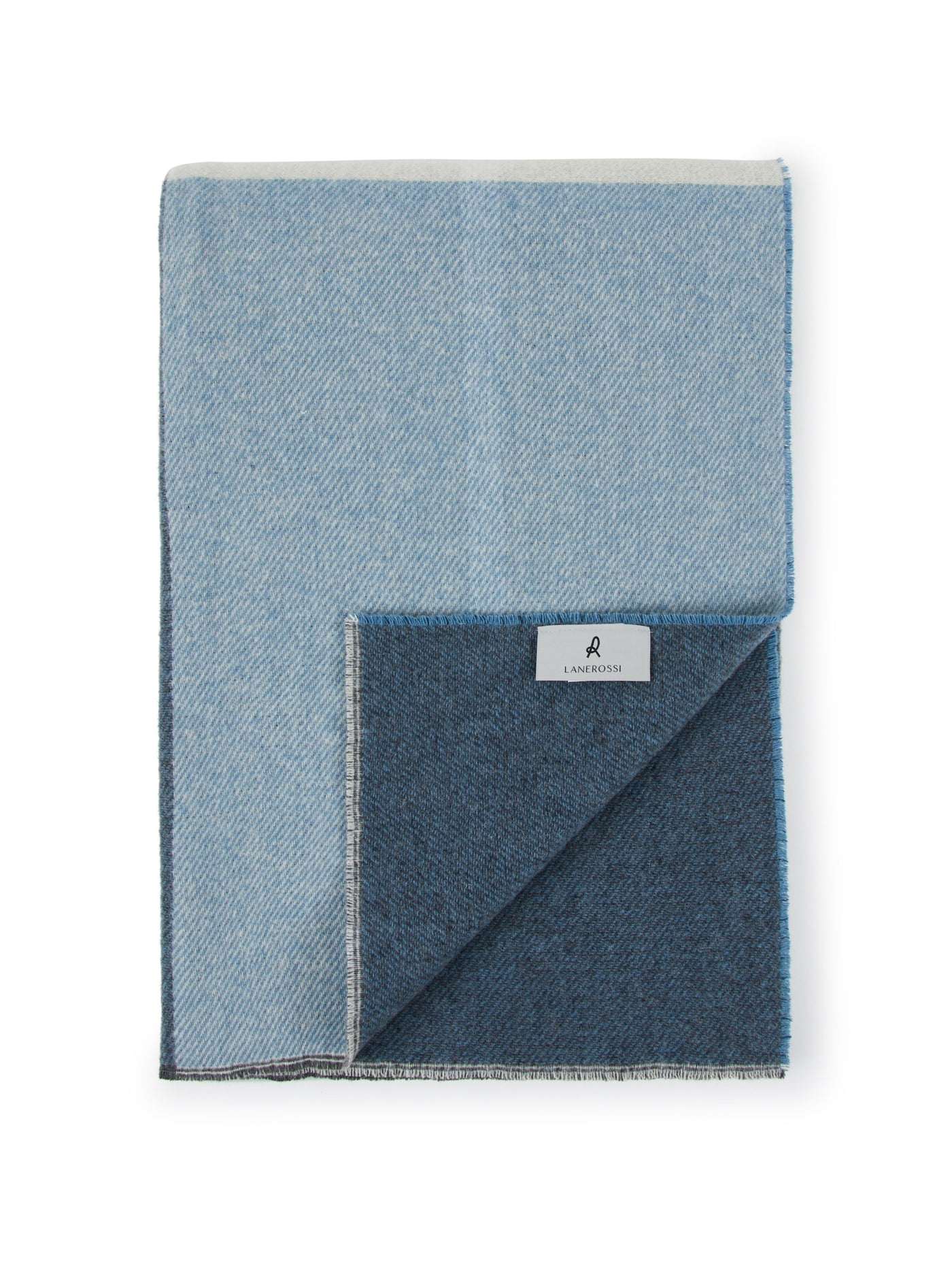 Folded Lanerossi Ascot throw showing light and navy blue reversible sides with herringbone weave.