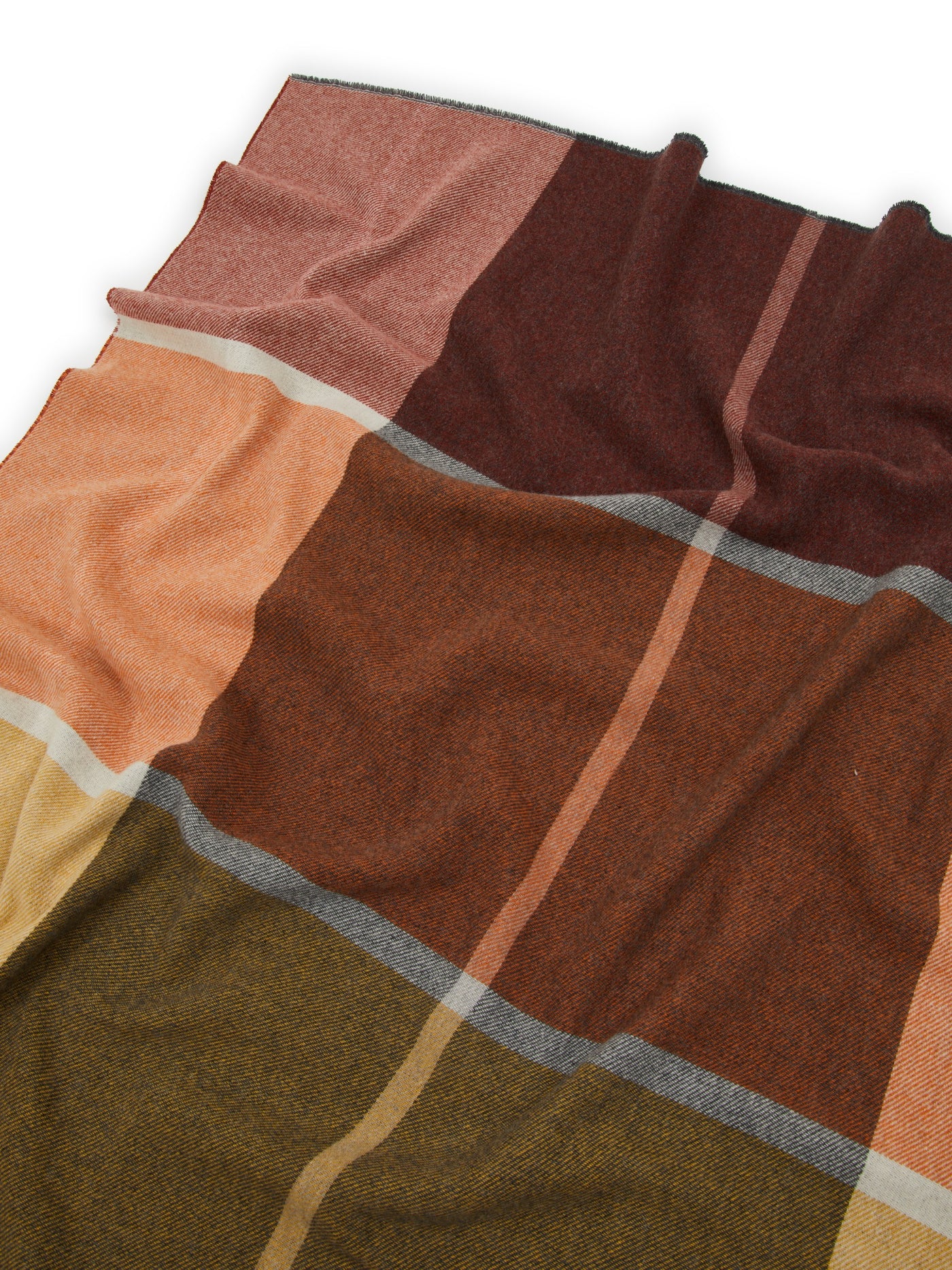 Close-up of Lanerossi Ascot throw's colorblock pattern in terracotta, burgundy, olive, and blush.