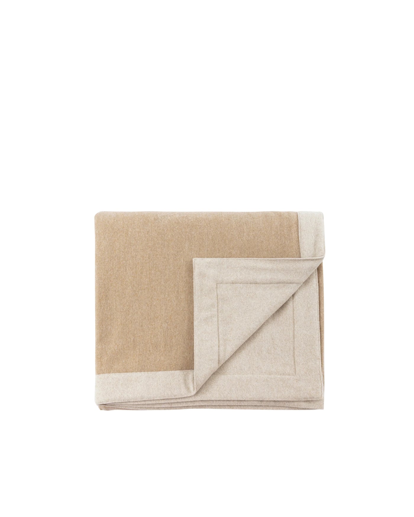 Folded camel and oatmeal wool blanket with contrast border detail, corner turned back.