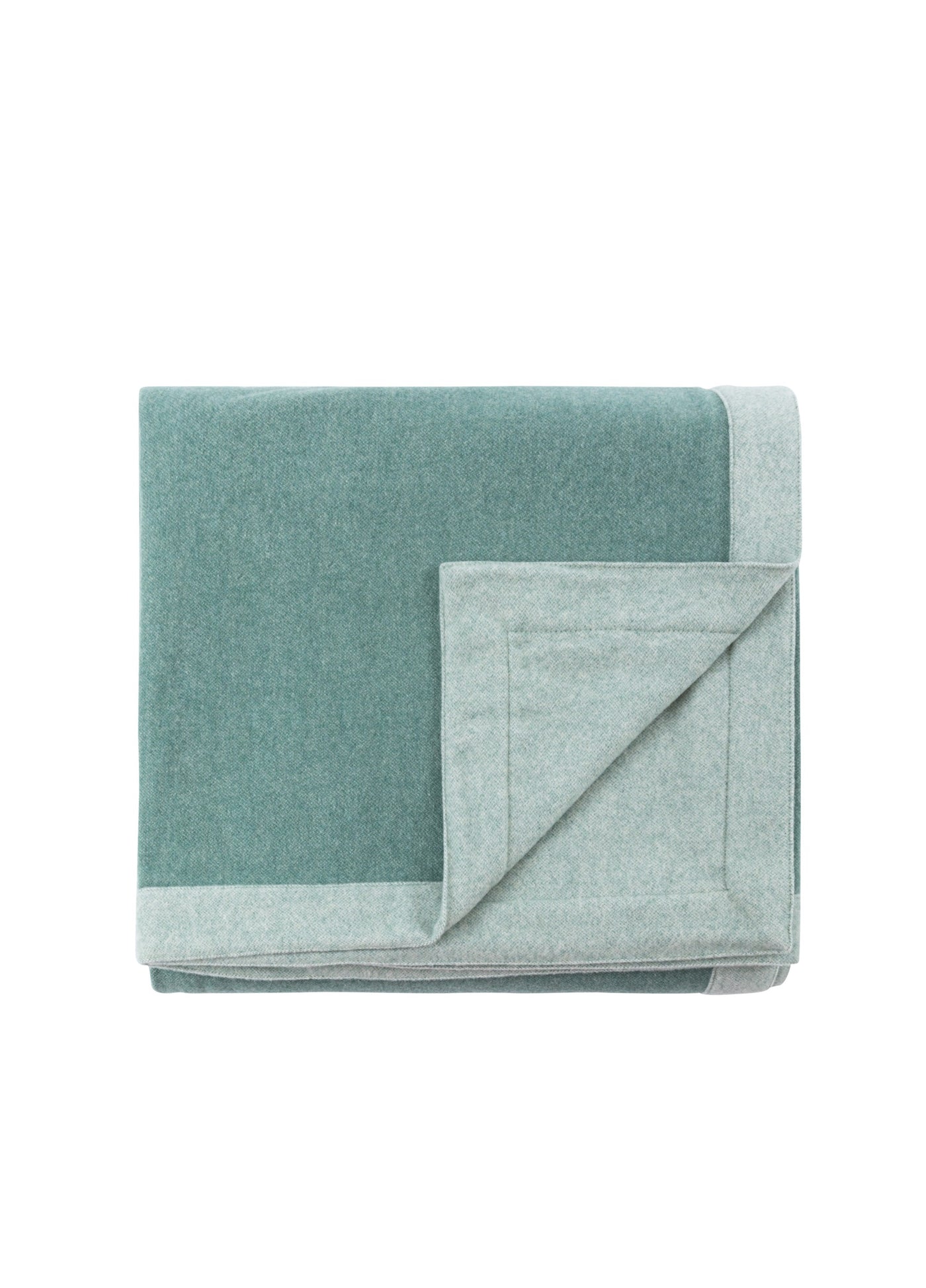 Folded sage green Lanerossi Afrodite blanket showing contrast reverse side in pale mint.