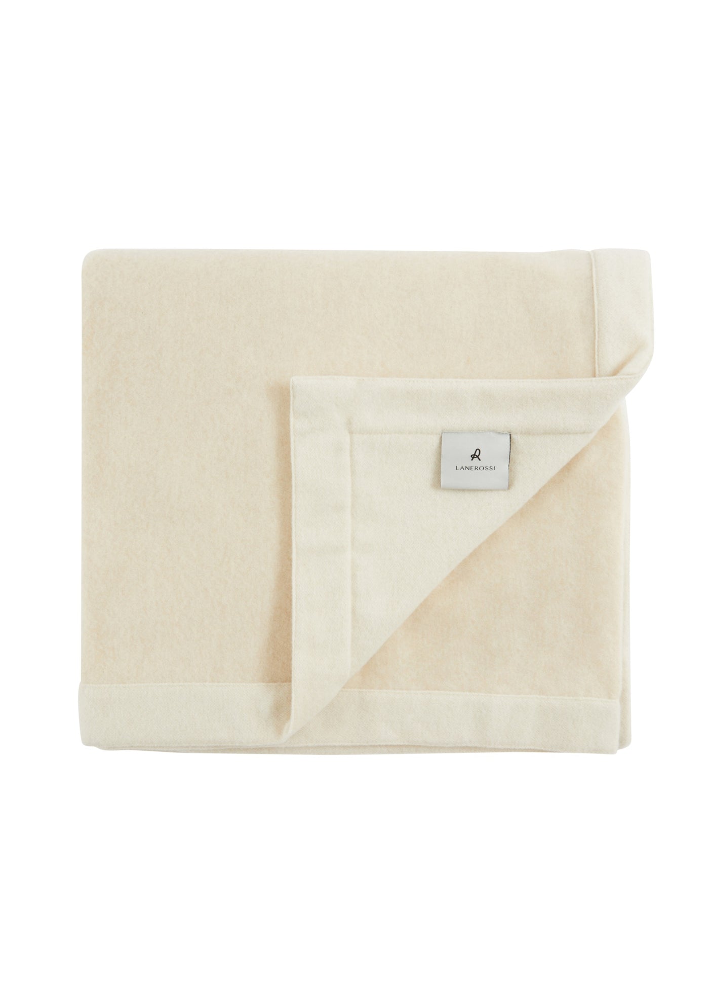 Ivory Lanerossi Afrodite blanket folded flat, corner turned to show satin trim and brand label.