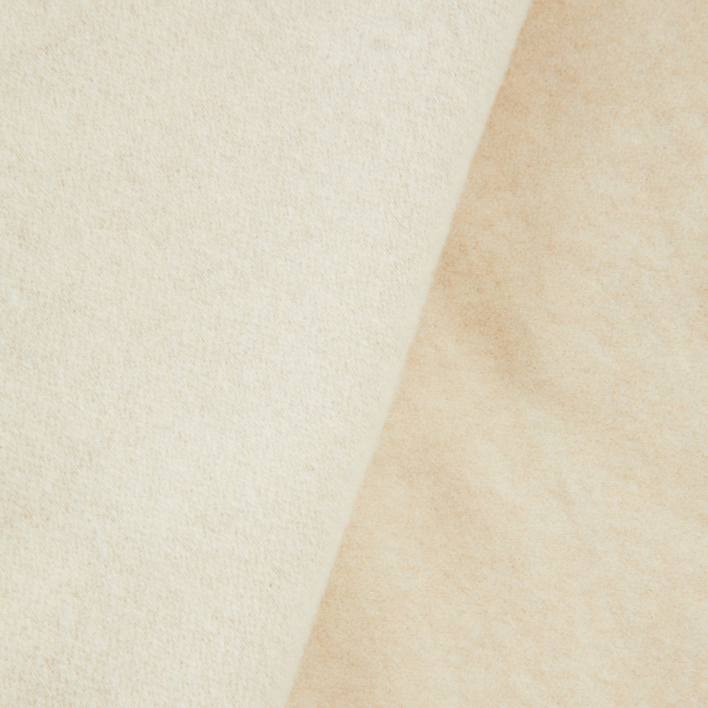 Close-up of ivory Lanerossi Afrodite blanket showing soft folded wool texture.