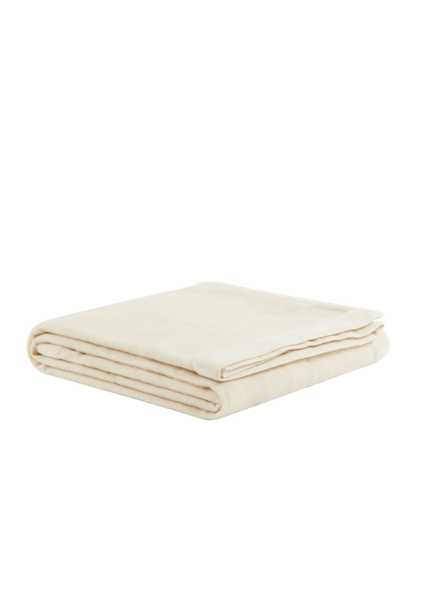 Afrodite blanket folded flat, ivory wool, smooth surface with subtle rolled edges.