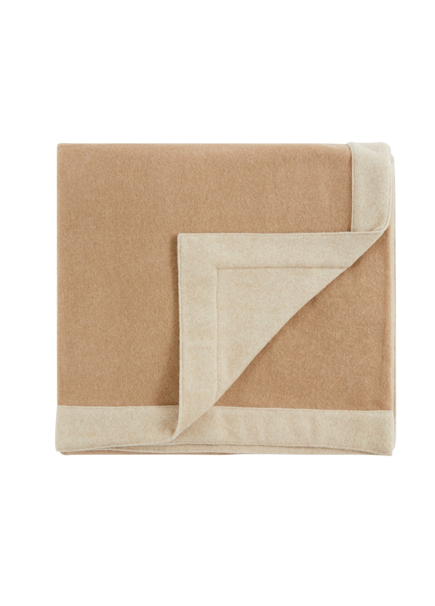 Folded camel wool blanket with ivory reverse, corner turned to reveal two-tone contrast.
