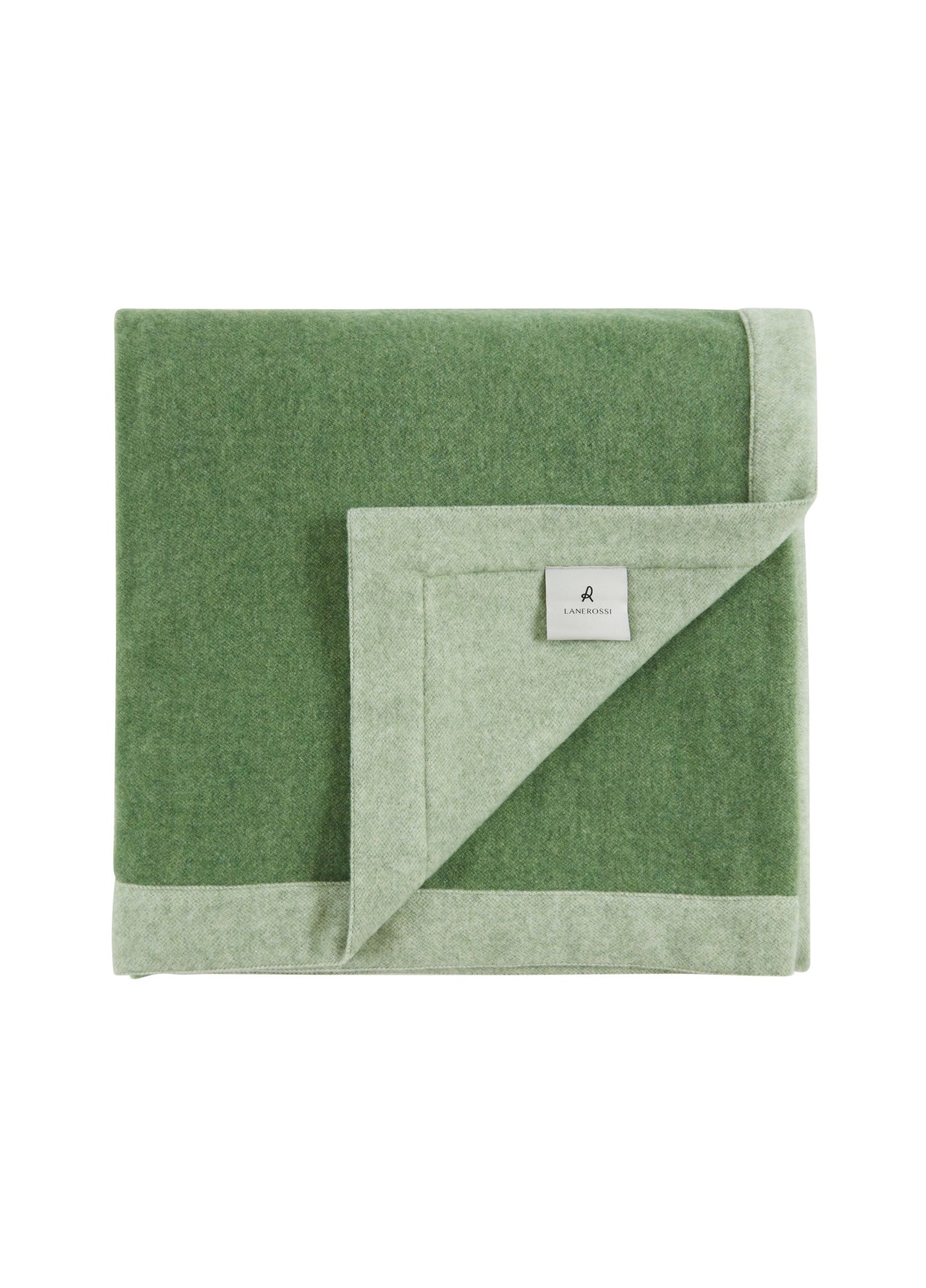 Folded sage green wool blanket with contrast pale green reverse and woven brand label.