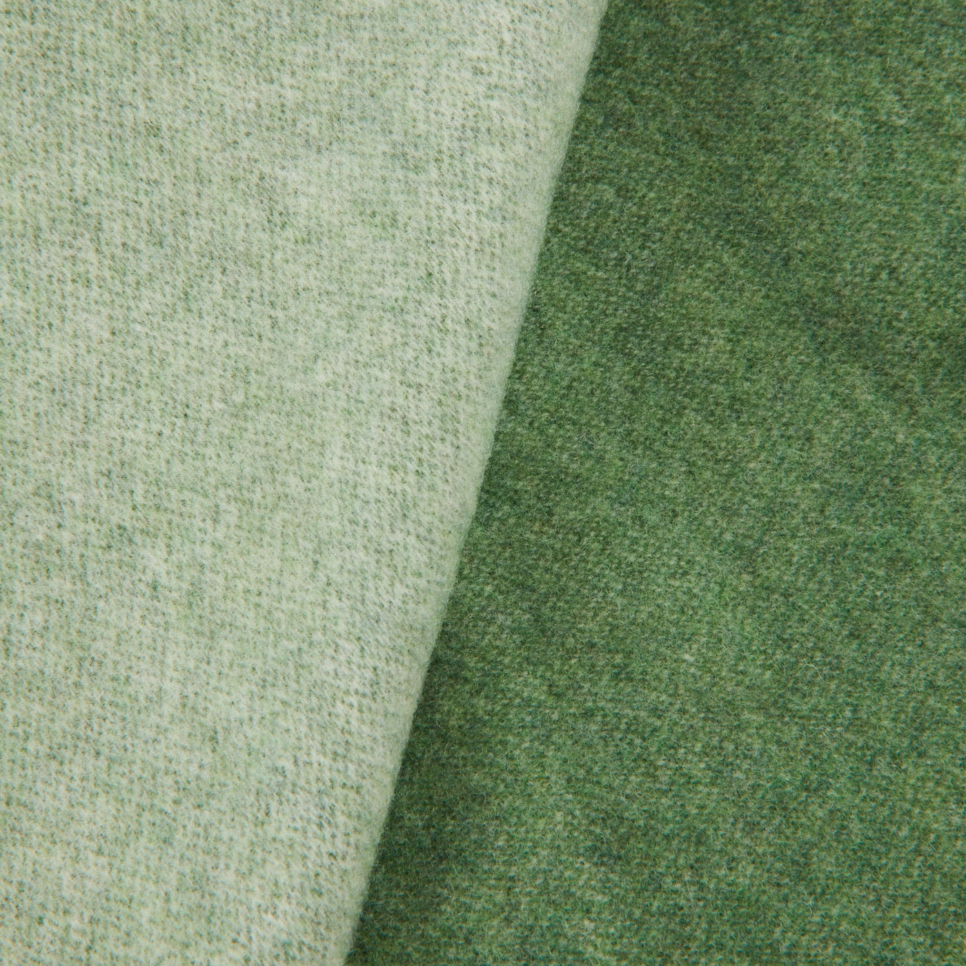 Close-up of Lanerossi Afrodite blanket showing sage and forest green wool reverse sides.