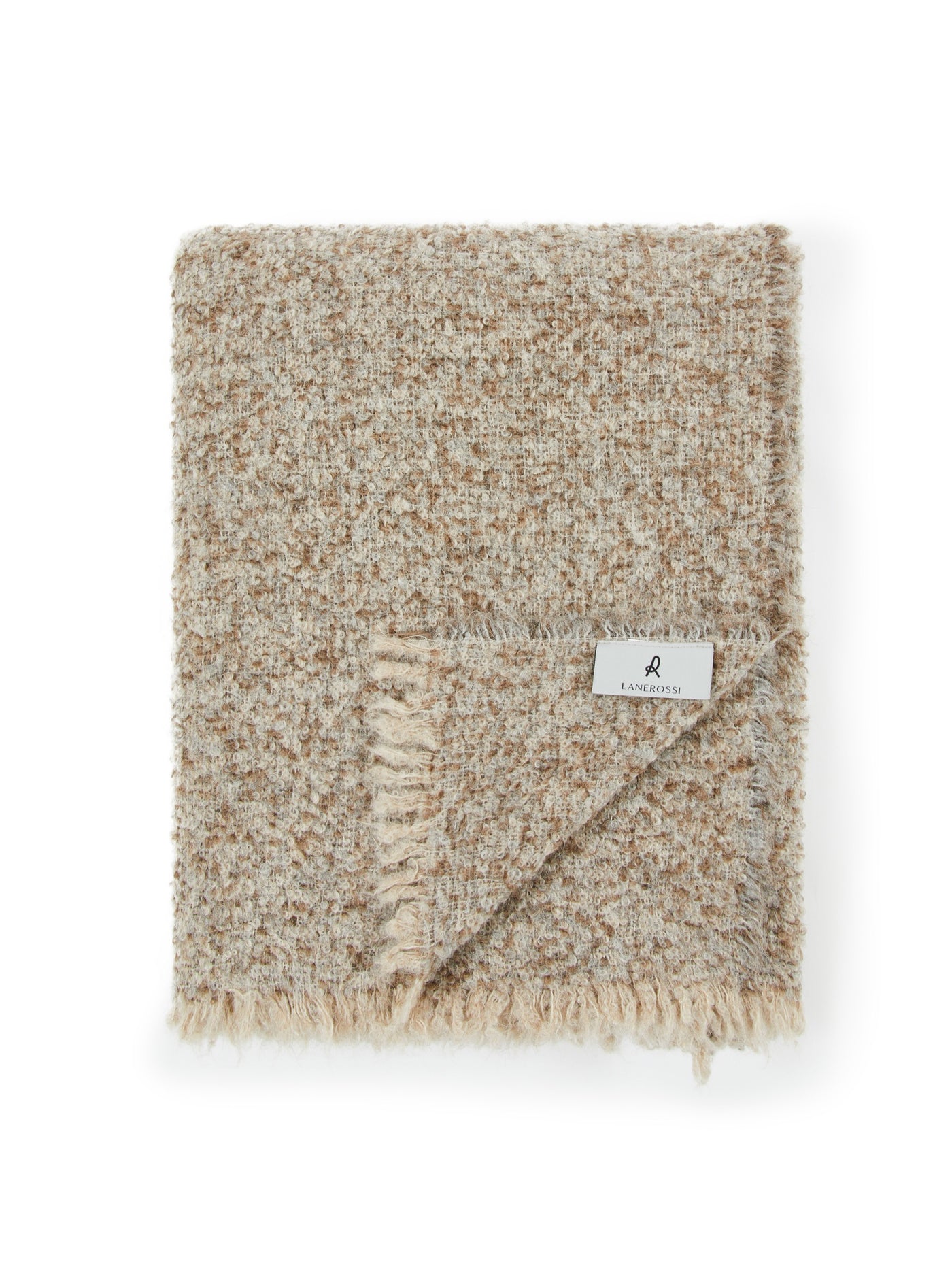 Lanerossi Bogotà throw in camel boucle weave, folded with fringe trim detail.