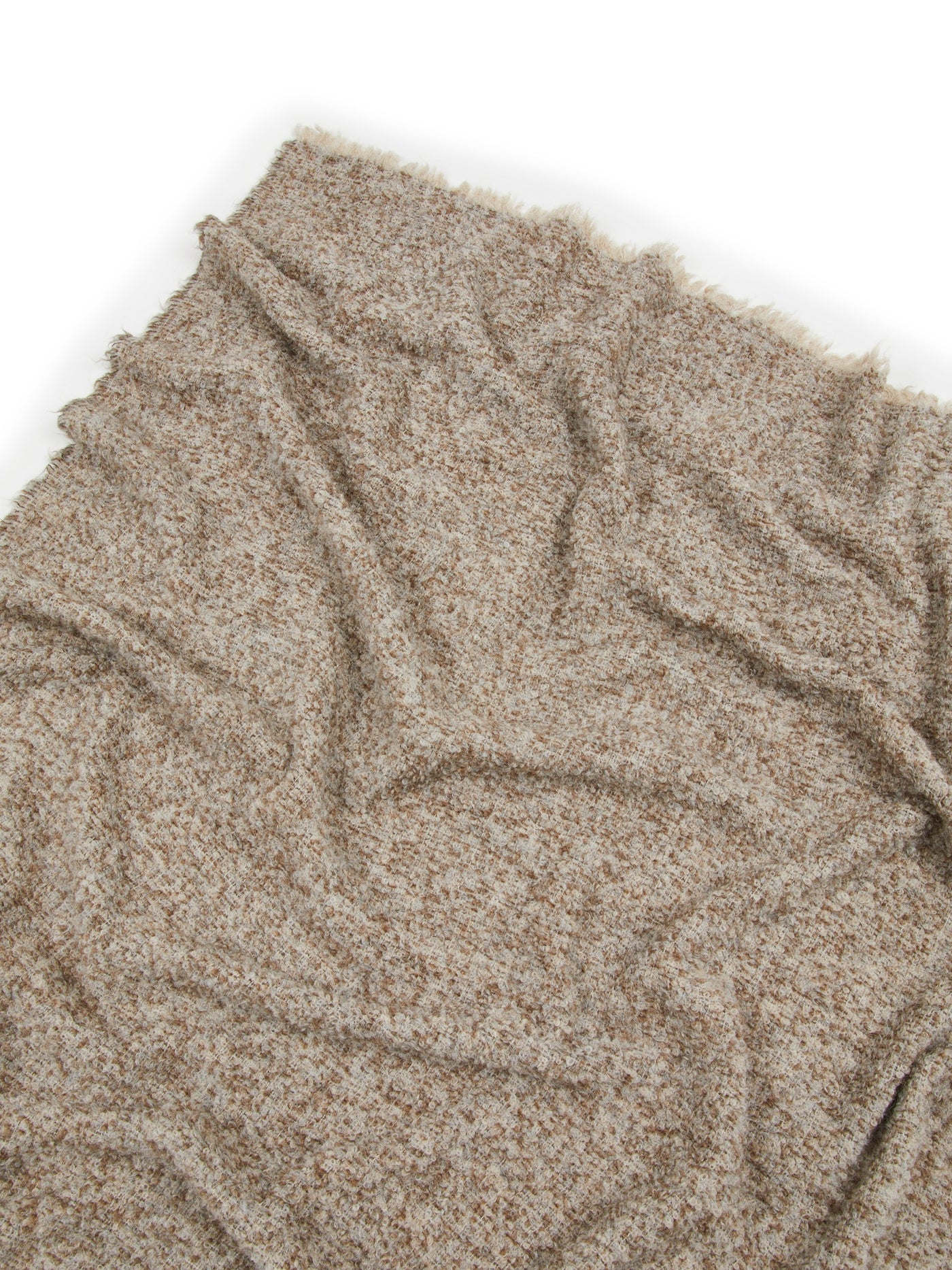 Close-up of Lanerossi Bogotà throw in oatmeal, showing frayed edge and bouclé texture.