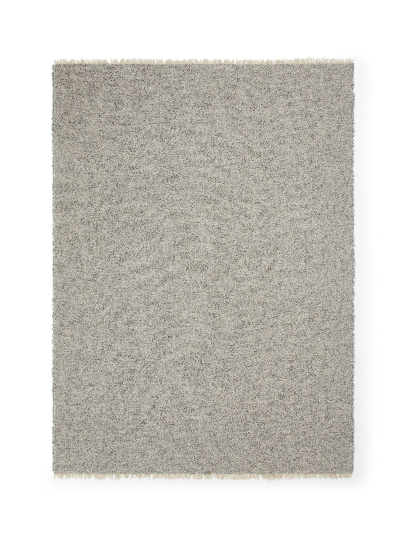 Lanerossi Bogotà throw in silver-grey boucle weave with fringe edges, flat lay view.