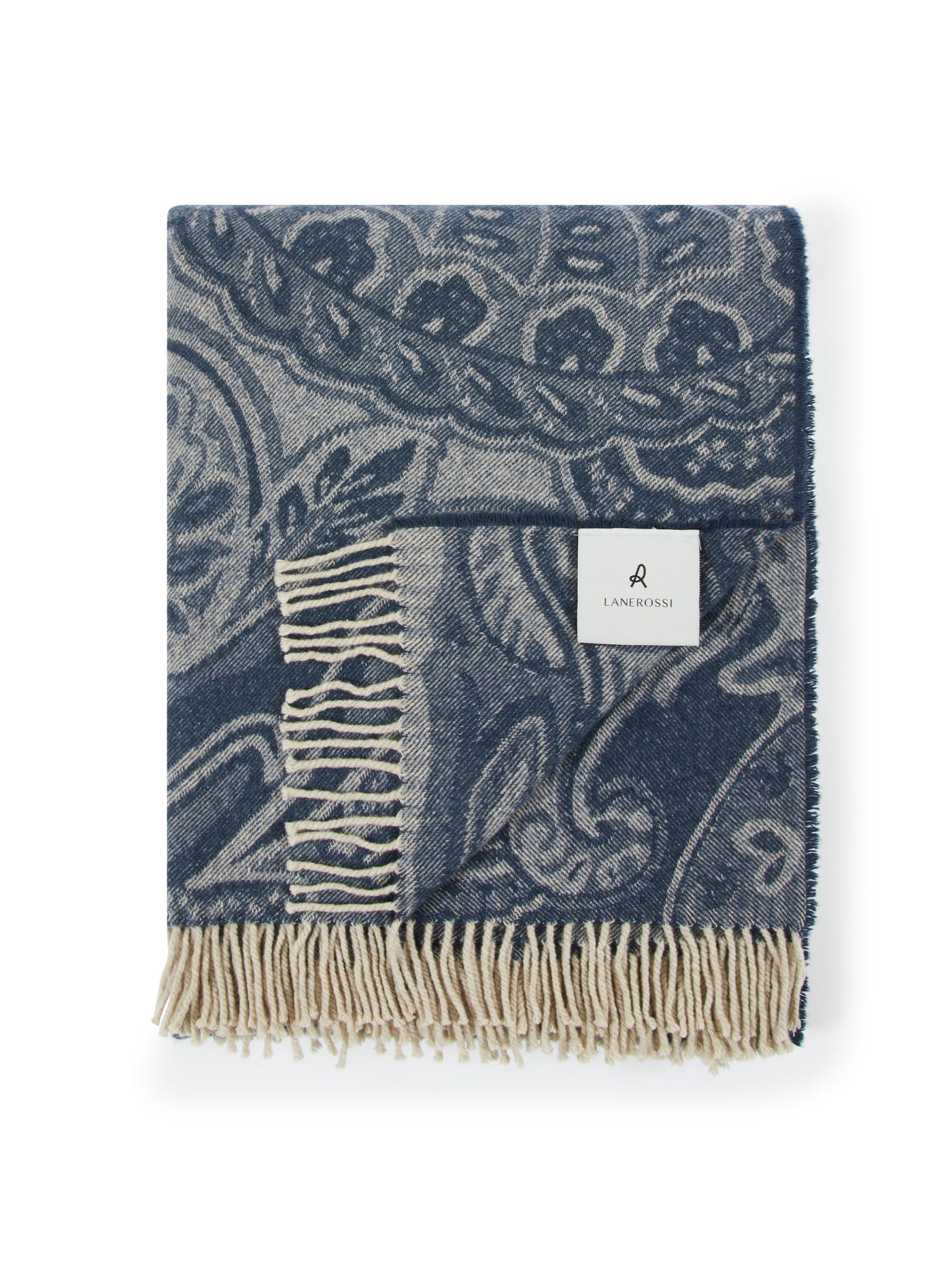 Lanerossi Bohémien throw folded, navy paisley jacquard pattern with cream fringe trim.