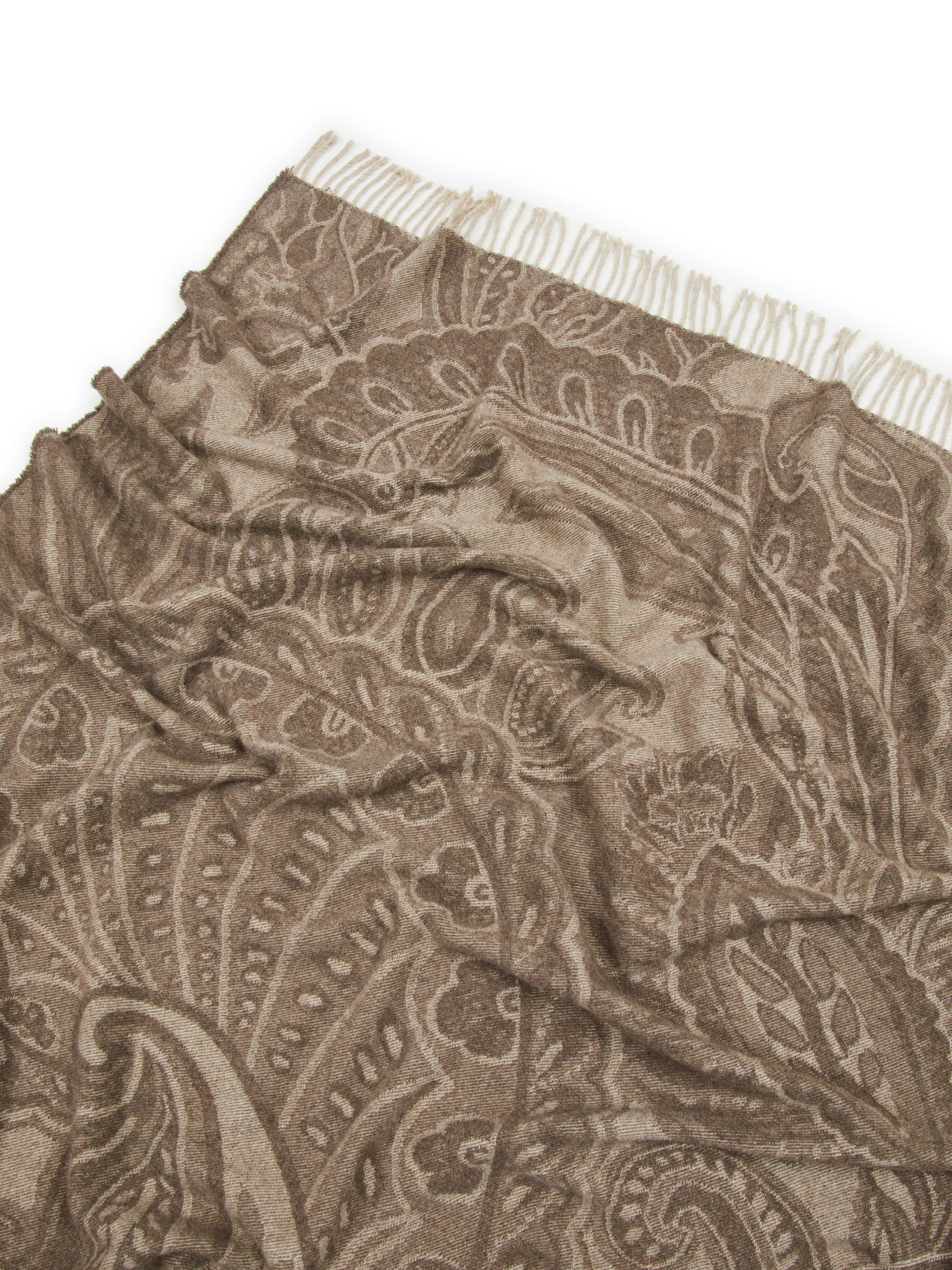 Close-up of Lanerossi Bohémien throw in taupe, showing intricate paisley jacquard weave and fringe edge.