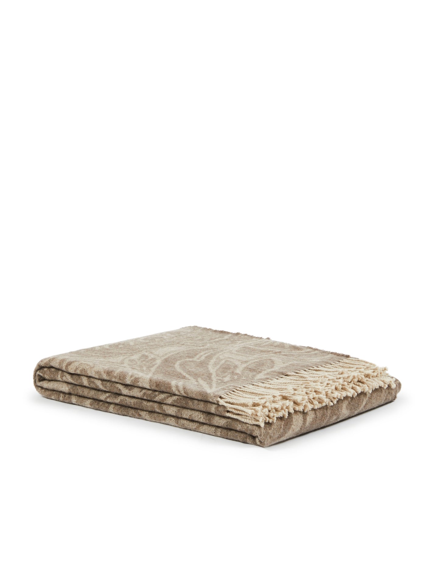 Folded taupe throw with tonal botanical jacquard pattern and ivory fringe trim.