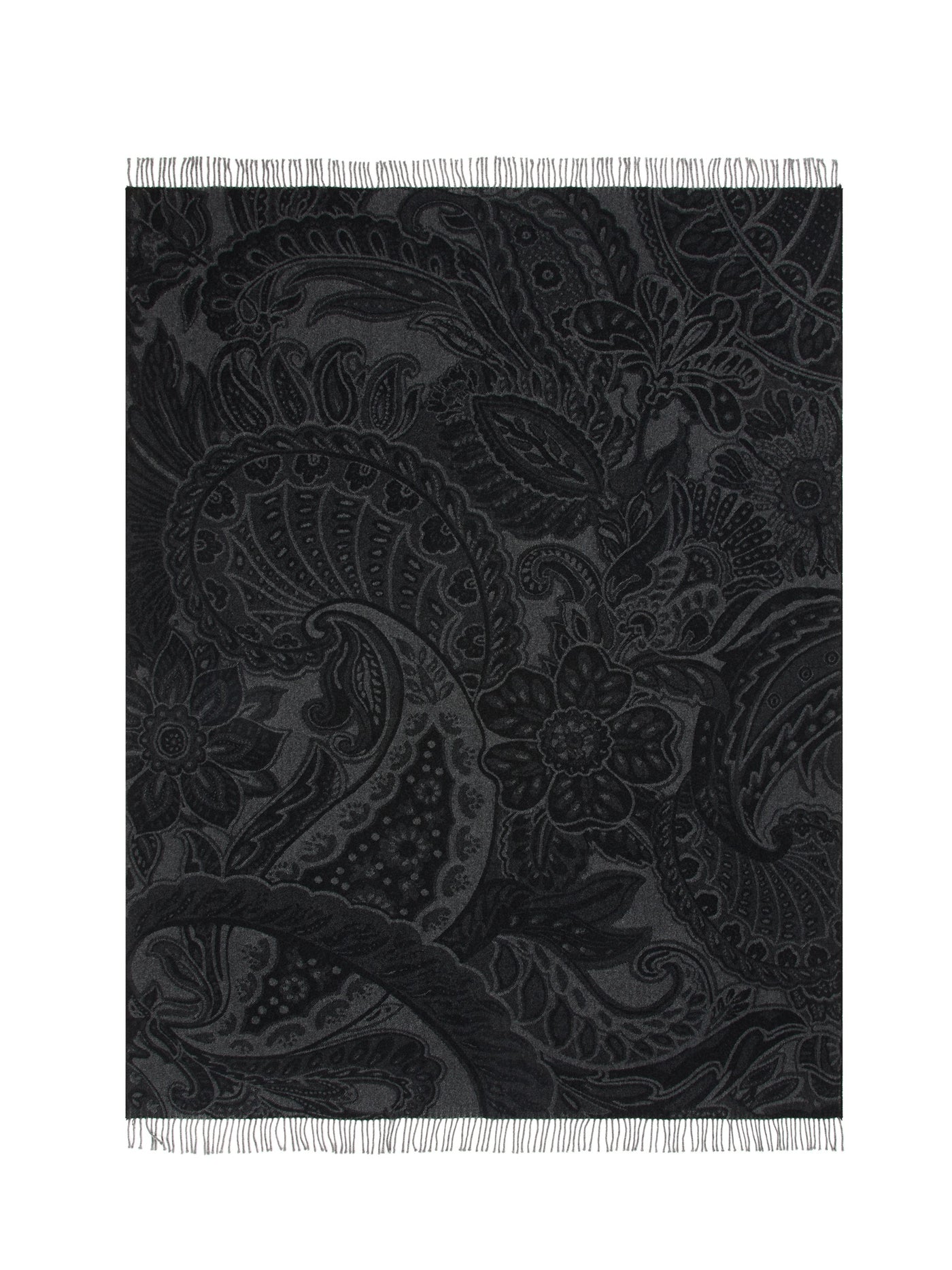 Charcoal throw with tonal paisley floral jacquard and fringe trim, flat lay.