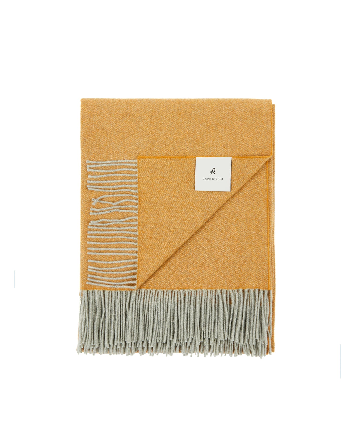 Folded saffron and sage Lanerossi Cassiopea throw with fringe trim and woven stripe detail.
