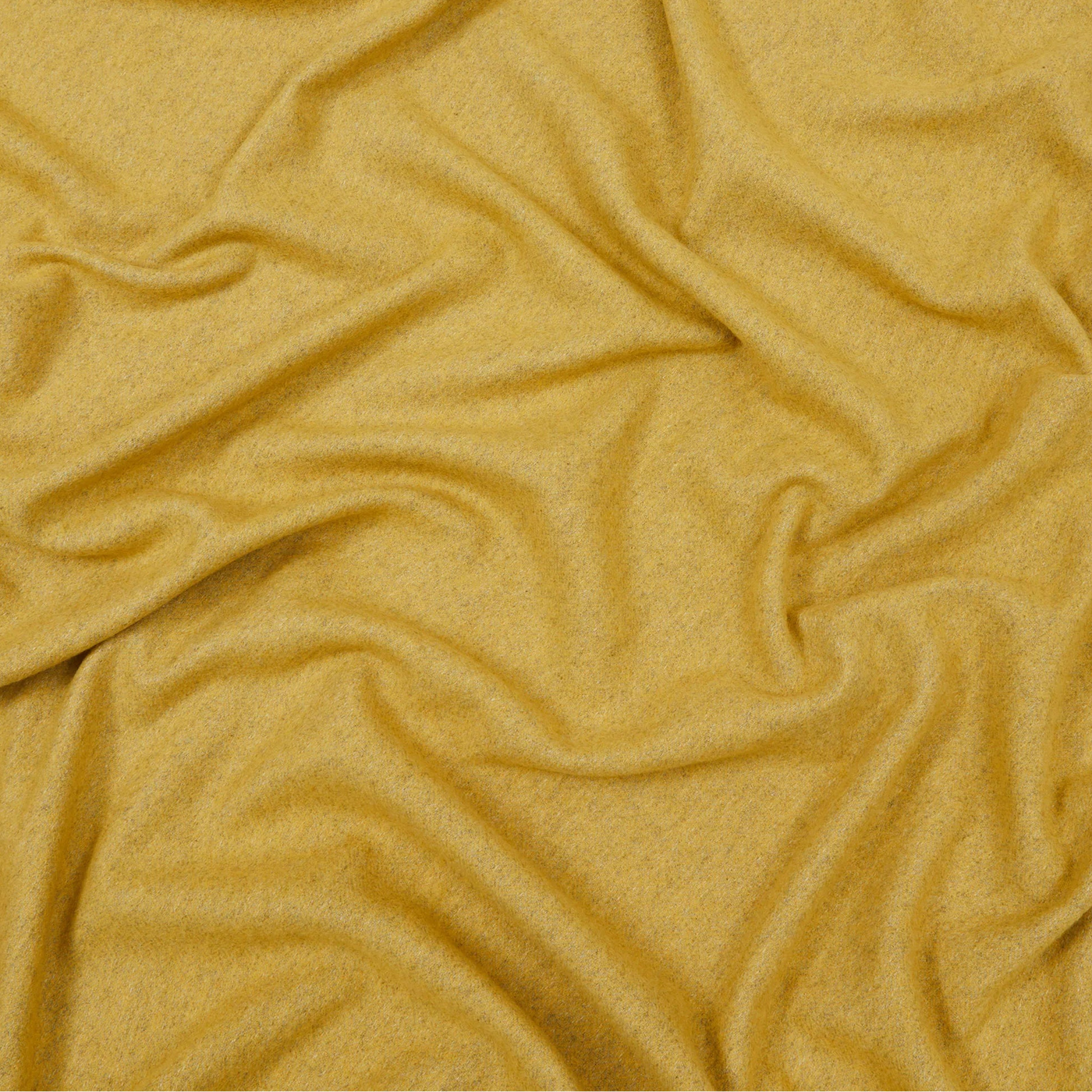 Lanerossi Cassiopea throw in saffron, showing soft draped fabric folds.