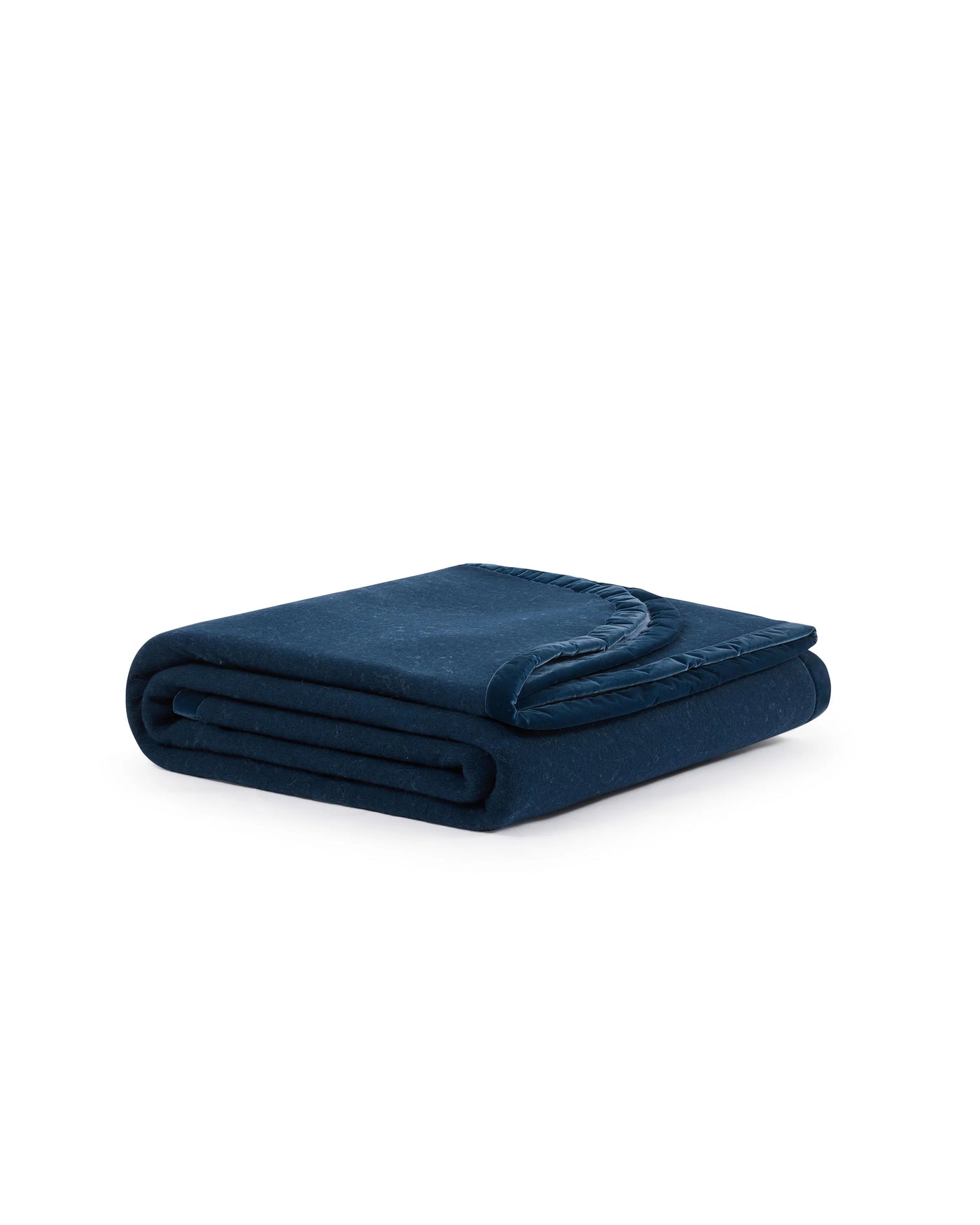 Navy blue Lanerossi Color Thermo blanket, neatly folded with decorative edge detail visible.
