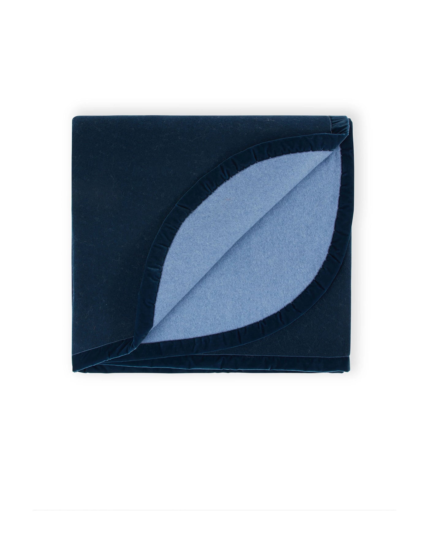 Lanerossi navy thermo blanket folded, revealing pale blue reverse with satin trim border.