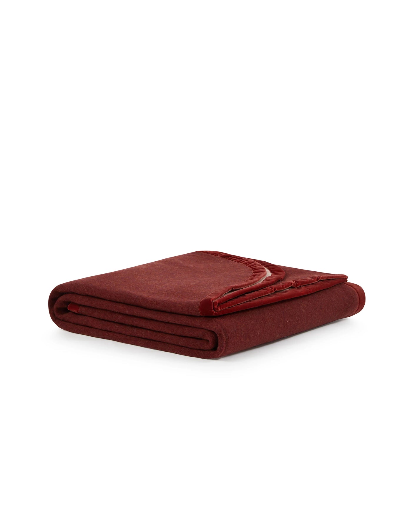 Lanerossi Color Thermo blanket in crimson, neatly folded with blanket-stitched edge detail.