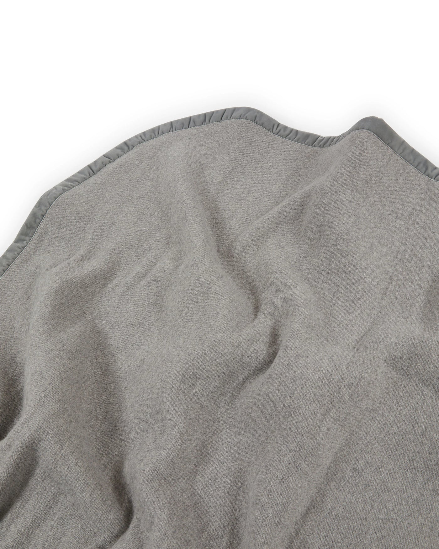 Close-up of Lanerossi Thermo Blanket in grey, showing blanket binding trim detail.