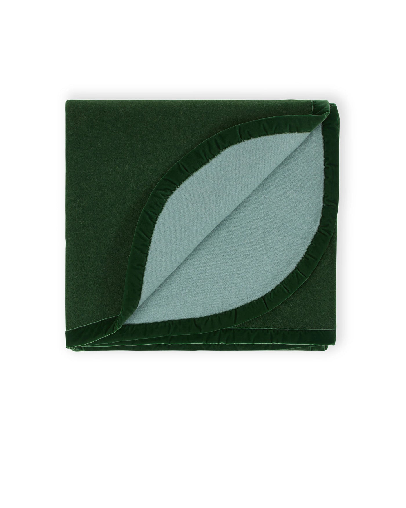 Lanerossi Color blanket folded, forest green exterior with sage reverse and ruffle trim.