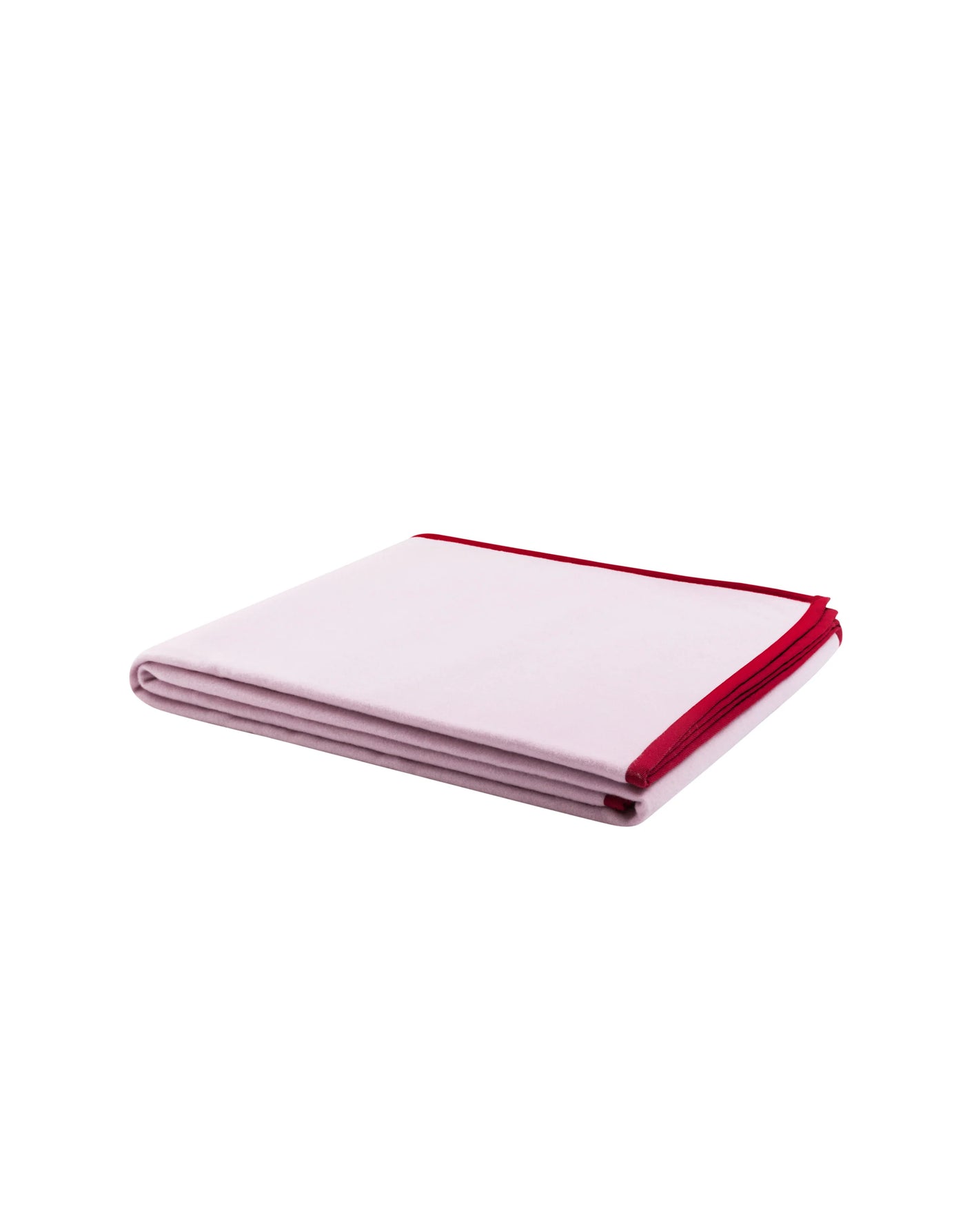 Lanerossi Cortina blanket folded, blush with bold red border trim visible on edge.