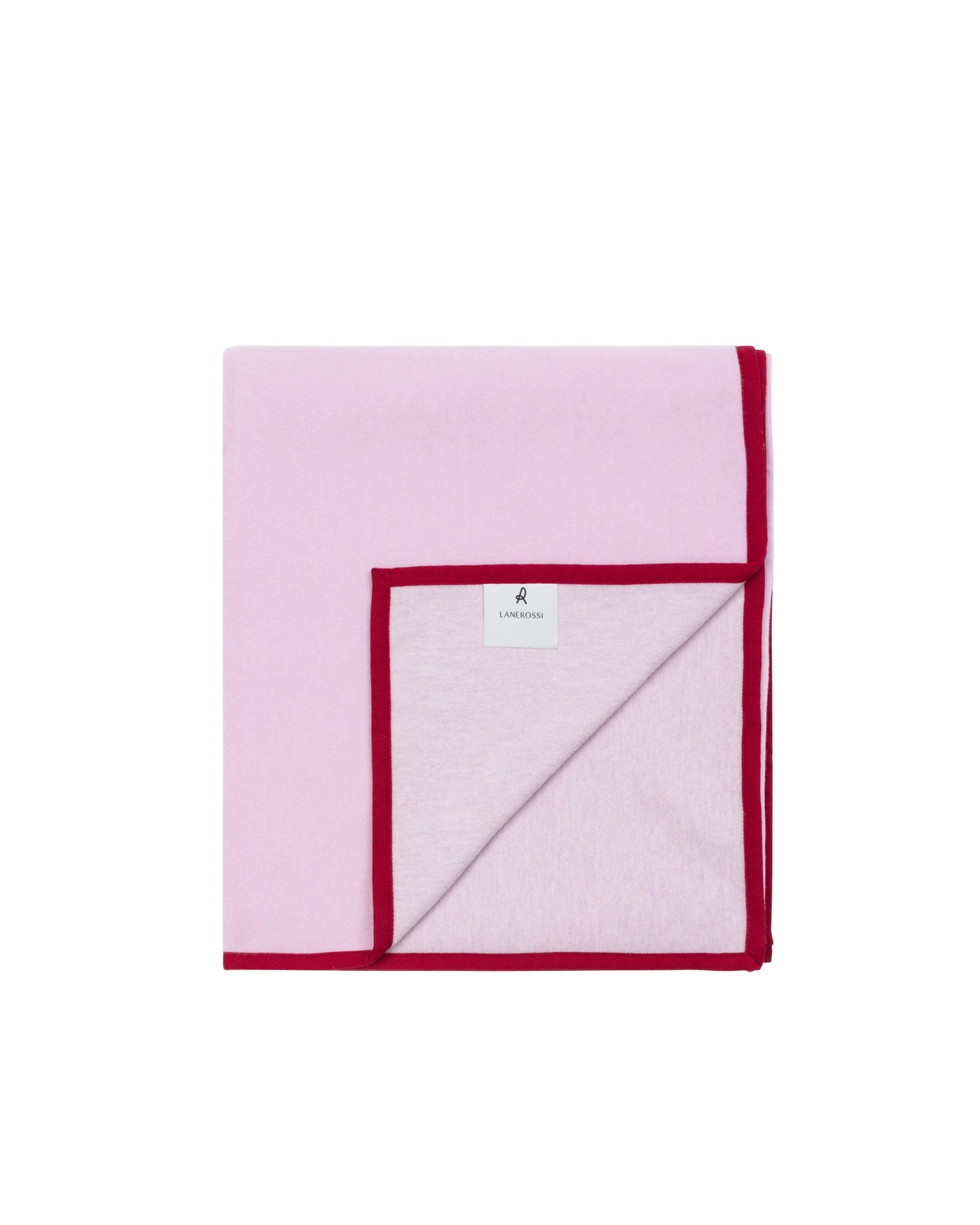 Folded pink blanket with crimson border trim, corner folded back to reveal reverse side.