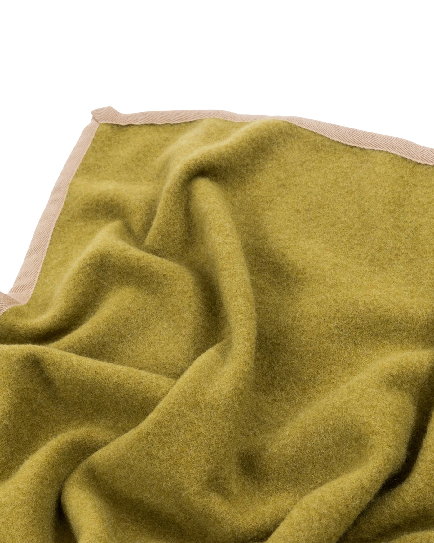 Close-up of Lanerossi Cortina blanket corner in olive with contrast sand trim.