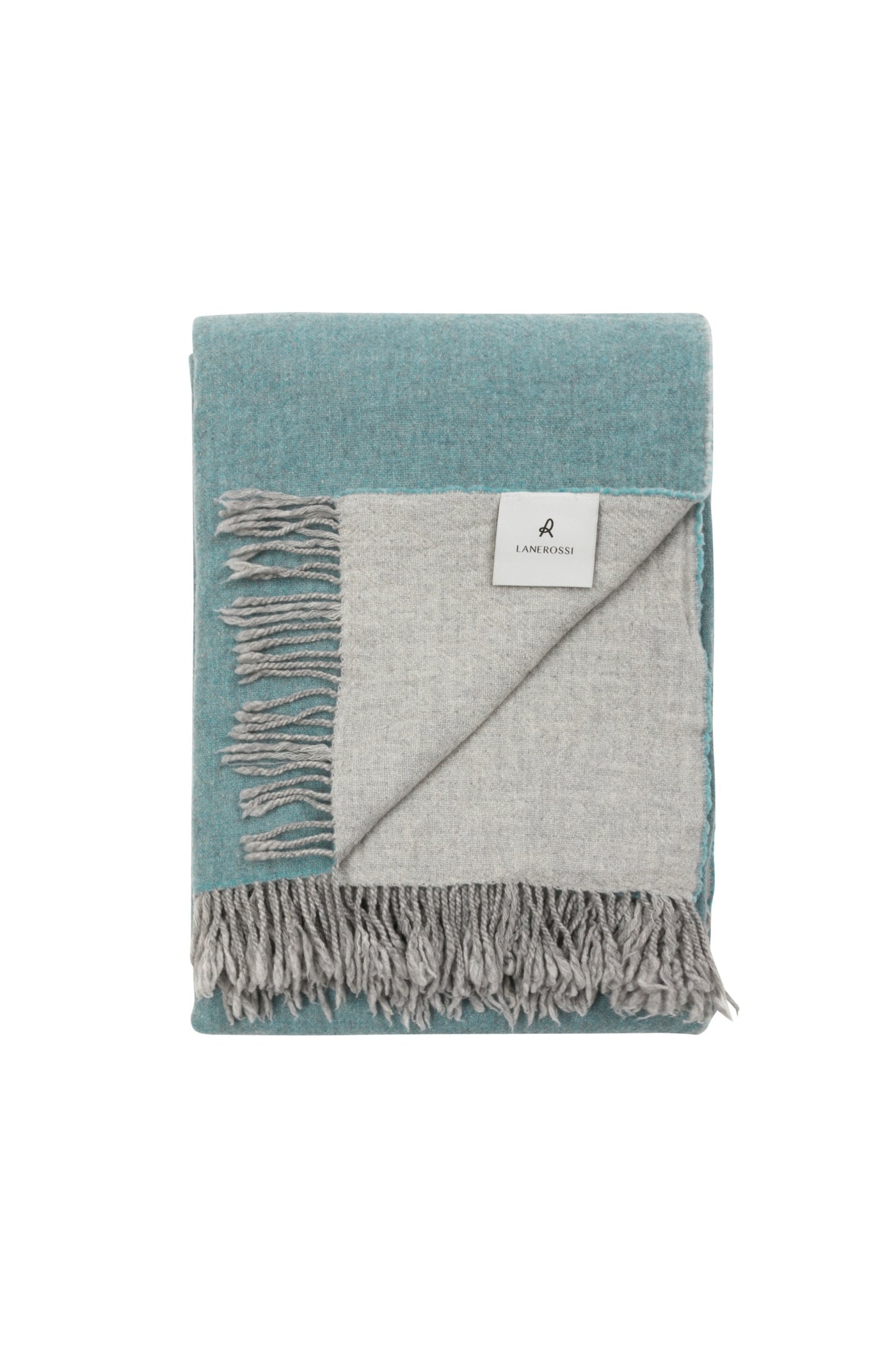 Folded Lanerossi Dioniso throw showing teal face and grey reverse with fringe trim.